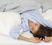 Thumb_woman-sleeping-bed-back