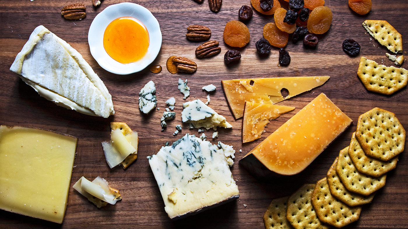 Hero-thanksgiving-cheese-board-entertaining-appetizers-fruit-crackers-cheese-meat-snacks-holidays-brie-blue-manchego-cheddar