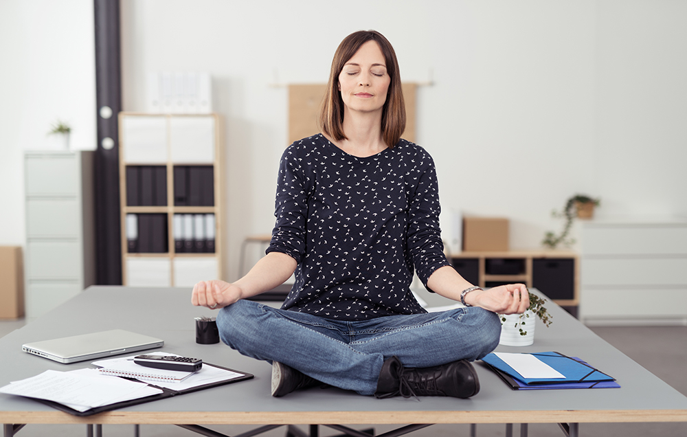 Woman-meditation-office-1000