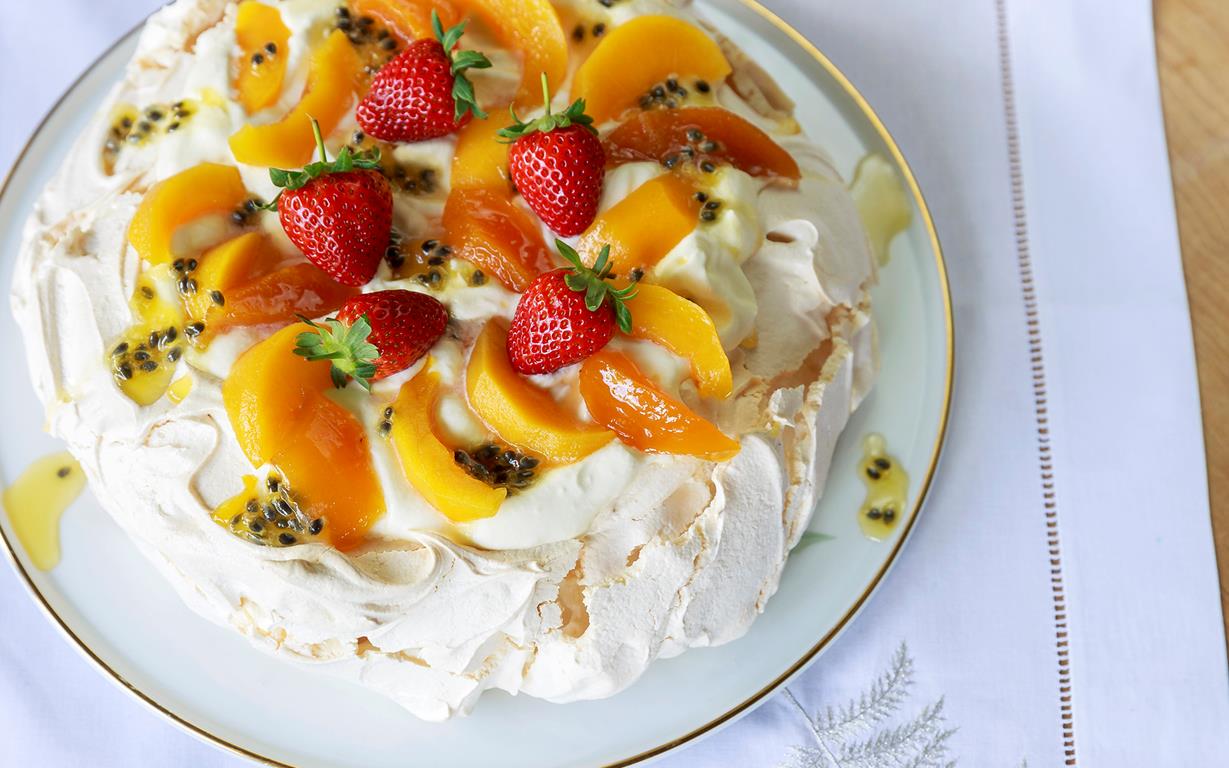 Classic-pavlova-with-spiced-peaches-and-passionfruit