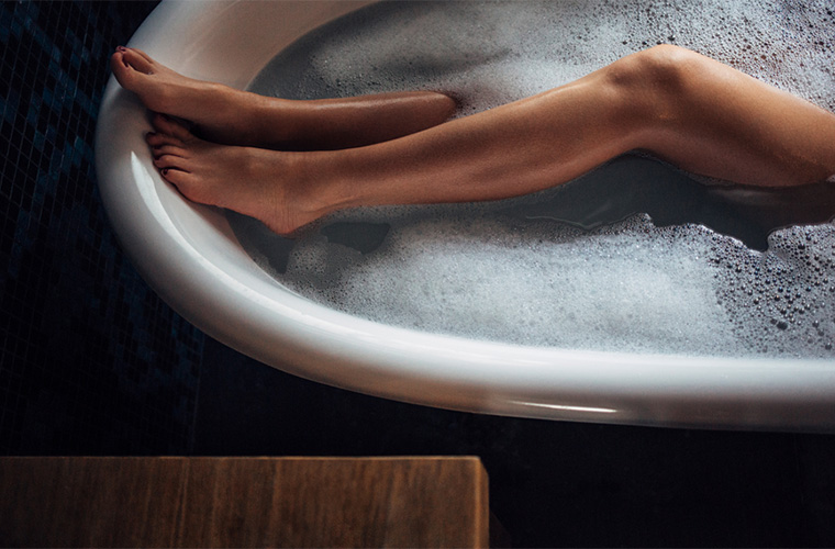 Stocksy-lumina-legs-in-a-bathtub
